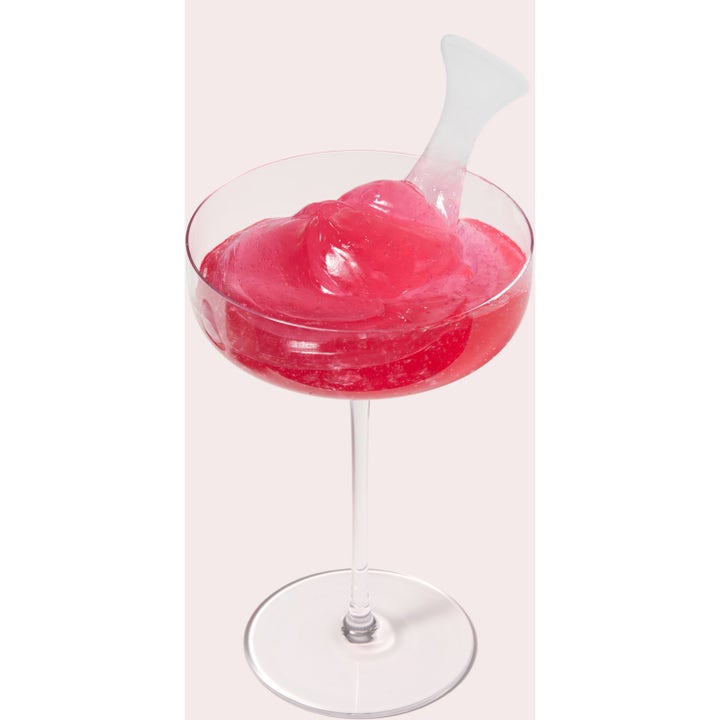Medicube Collagen Jelly Cream 50 ml fuktighetskrem med rosa geleaktig tekstur i et glass med spatel