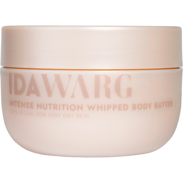 Ida Warg Intense Nutrition Whipped Body Butter nærende krem for svært tørr hud i en ferskenfarget matt krukke