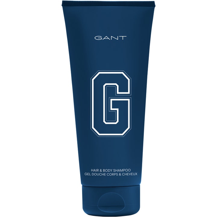 Gant Hair & Body Shampoo oppfriskende dusjsåpe i mørkeblå tube med stor hvit G-logo som rengjør hår og kropp.
