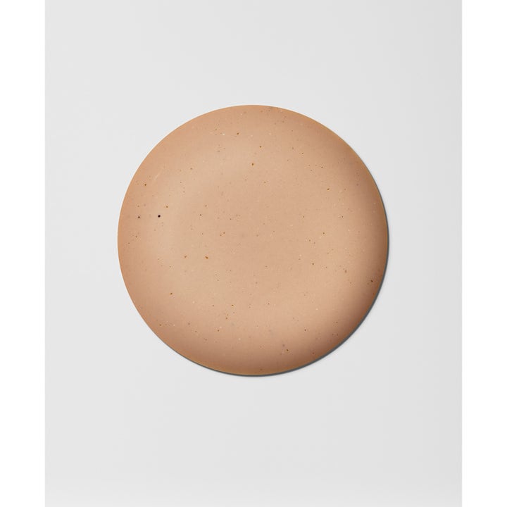 Heliocare Pigment Solution Fluid SPF 50+ 50 ml solkrem mot pigmentflekker med en beige flytende tekstur