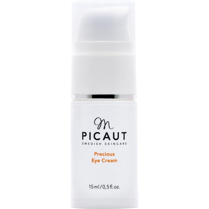 M. Picaut Precious Eye Cream 15 ml fuktighetsgivende øyekrem i hvit pumpeflaske med sølvdetalj og klart lokk.