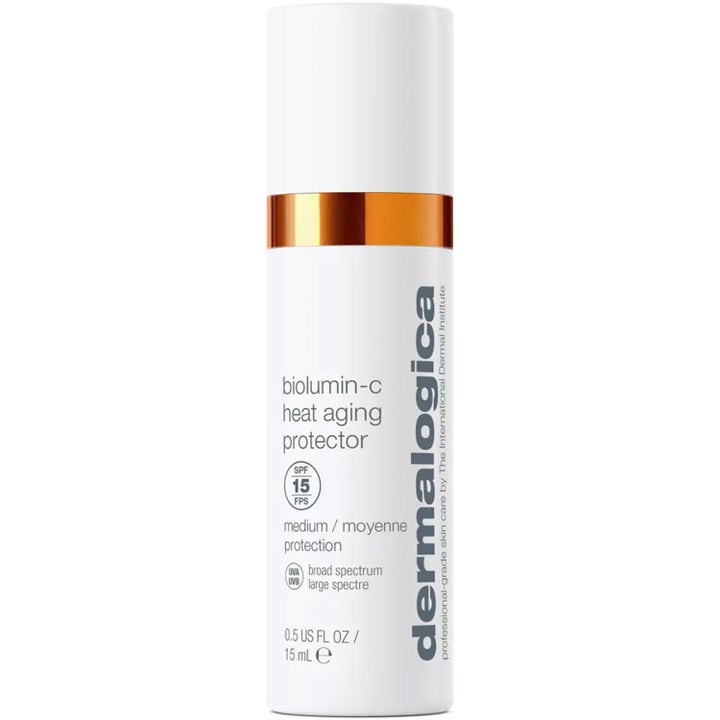 Dermalogica Biolumin-C Heat Aging Protector 15 ml ansiktsspray med SPF 15 i hvit beholder med skinnende oransje ring