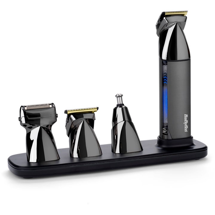 BaByliss Super-X Metal Multi-Trimmer for presis pleie i grått metall med blått lys og tre hoder på ladebase