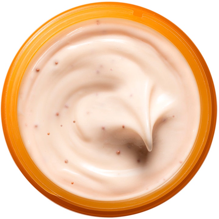 Origins GinZing Glow-Boosting Mask 75 ml ansiktsmaske gir glød med en kremet ferskenfarget tekstur i oransje krukke
