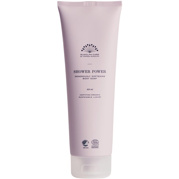 Rudolph Care Shower Power 250 ml mykgjørende dusjsåpe i en lys lilla tube med hvit kork.