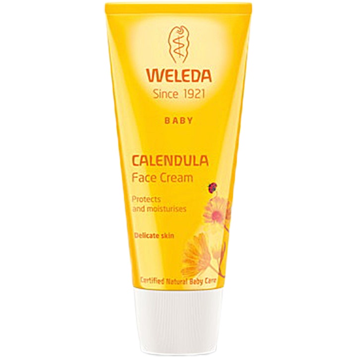 Weleda Calendula Face Cream Baby 50 ml beskyttende ansiktskrem i gul tube med hvit kork og ringblomst.