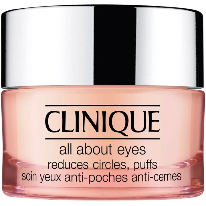 Clinique All About Eyes 15 ml øyekrem som reduserer poser og mørke ringer i ferskenfarget krukke med sølvlokk