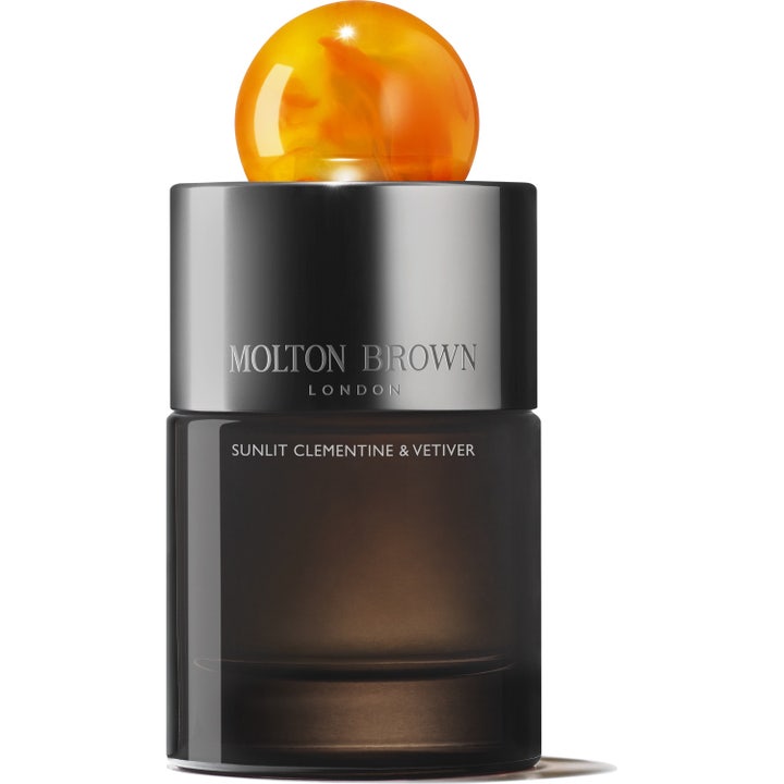Molton Brown Sunlit Clementine & Vetiver Eau de Parfum 100 ml i mørk glassflaske med oransje sfærisk kork