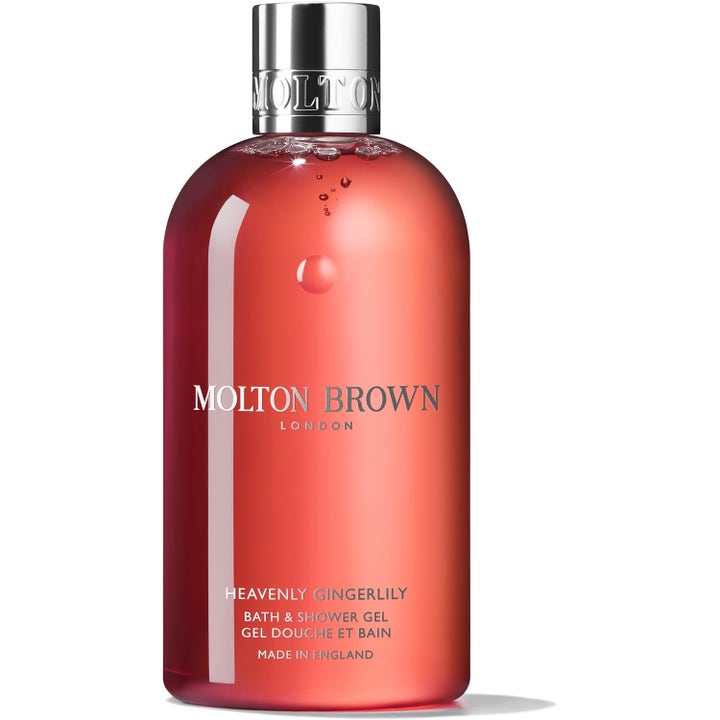 Molton Brown Heavenly Gingerlily 300 ml oppfriskende dusjsåpe i gjennomsiktig flaske med korallrød gelé og sølvfarget kork.