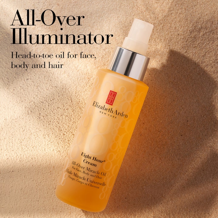 Elizabeth Arden Eight Hour All-Over Miracle Oil 100 ml fuktgivende kroppsolje i oransje sprayflaske på lys sand