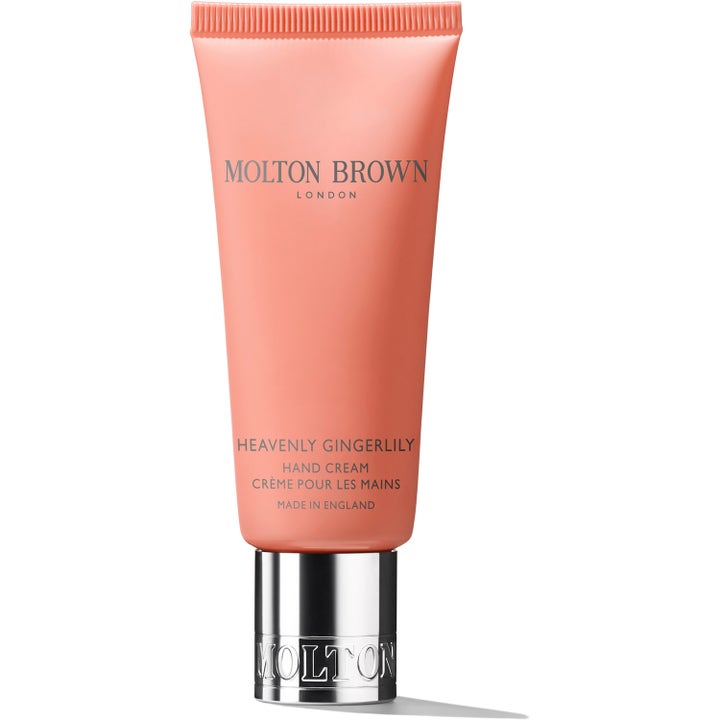 Molton Brown Heavenly Gingerlily 40ml fuktighetsgivende håndkrem i ferskenfarget tube med sølvfarget kork.