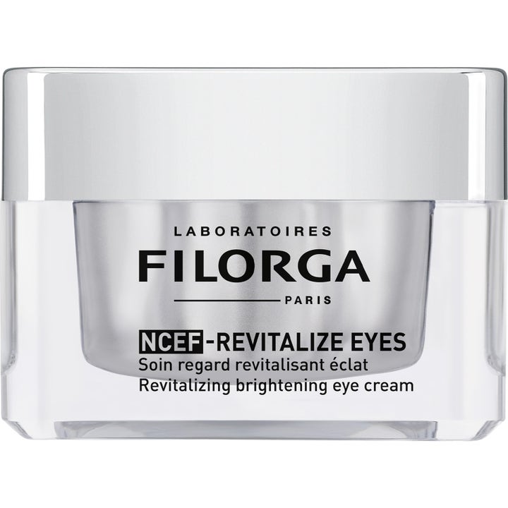 Filorga NCEF-REVITALIZE EYES 15ml revitaliserende øyekrem i en gjennomsiktig krukke med sølvfarget lokk og kjerne.