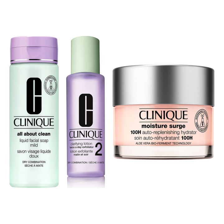 Clinique Hudpleiesett med rens, ansiktsvann og Moisture Surge 100H krukke i lilla, grønne og rosa farger.