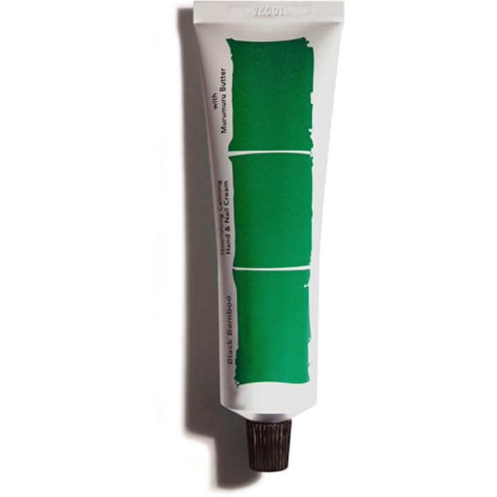 Black Bamboo Nourishing Calming Hand & Nail Cream beroligende håndkrem på hvit tube med grønt motiv og sort kork