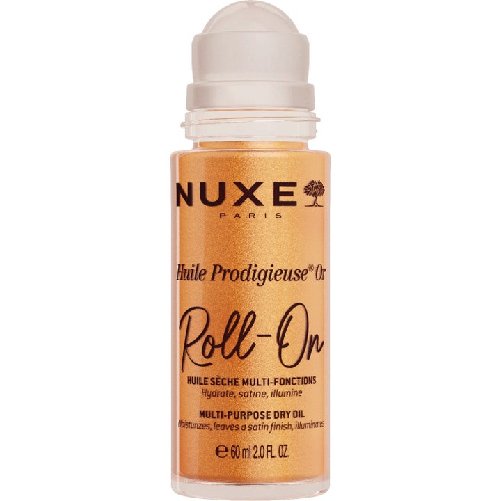 Nuxe Huile Prodigieuse Or Roll-On 60 ml glitrende tørrolje i transparent flaske med hvit roll-on-applikator som gir glød