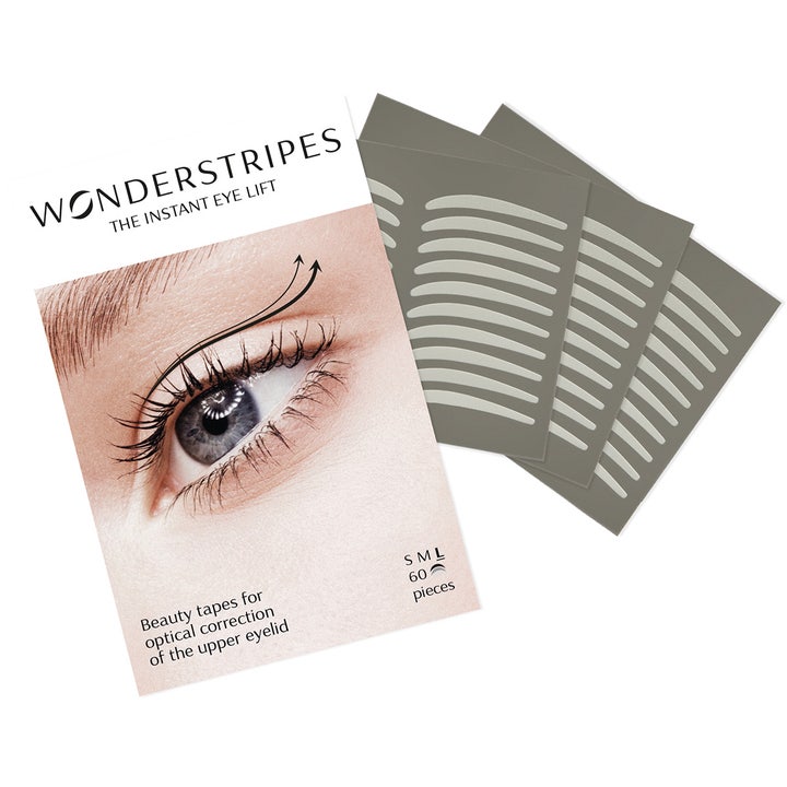 Wonderstripes The Instant Eye Lift 60 stk øyeløft-tape som gir et våkent blikk ved siden av hvit eske.