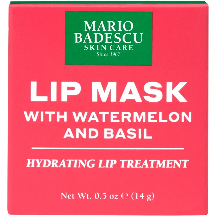 Mario Badescu Lip Mask Watermelon &amp; Basil 14 g gir fuktighet i en rosa ytteremballasje med grønn logo og hvit tekst.