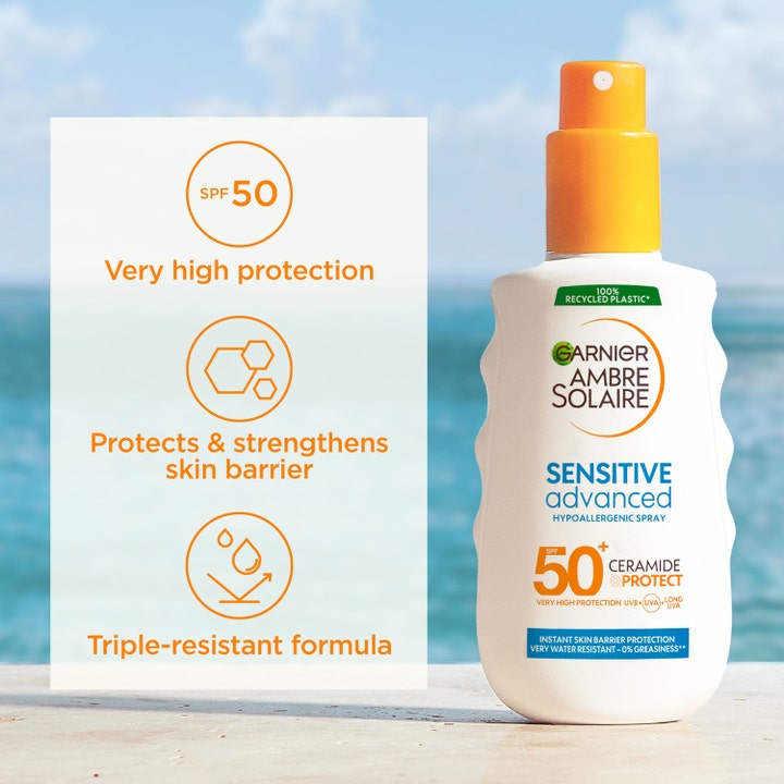 Garnier Ambre Solaire Sensitive Advanced 150 ml solspray SPF 50 med ceramider i hvit flaske med oransje kork