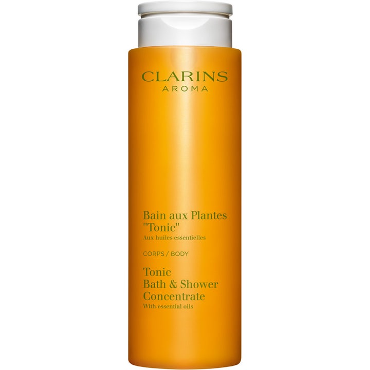 Clarins Aroma Tonic Bath & Shower Concentrate 200 ml oppstrammende dusjsåpe i oransje flaske med hvit kork