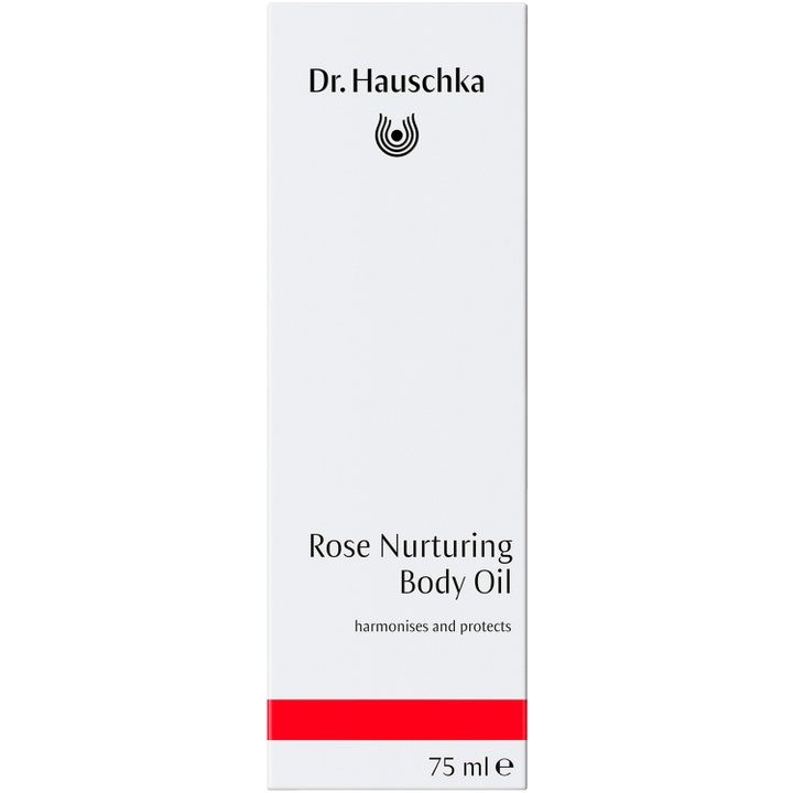 Dr. Hauschka Rose Nurturing Body Oil 75 ml pleiende kroppsolje i hvit ytteremballasje med rød stripe.