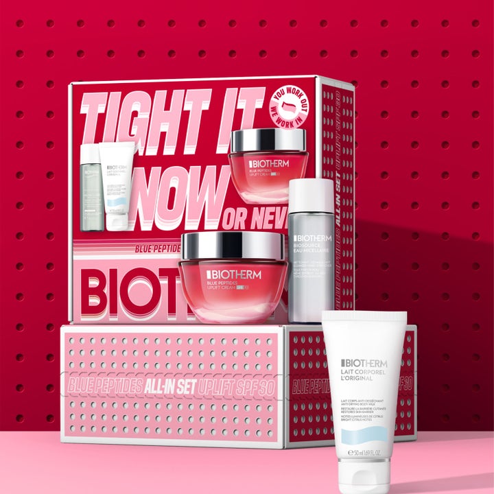 Biotherm Blue Peptides SPF30 Set 1 stk oppstrammende ansiktspleie med rosa krukker og hvit tube foran rød gaveeske