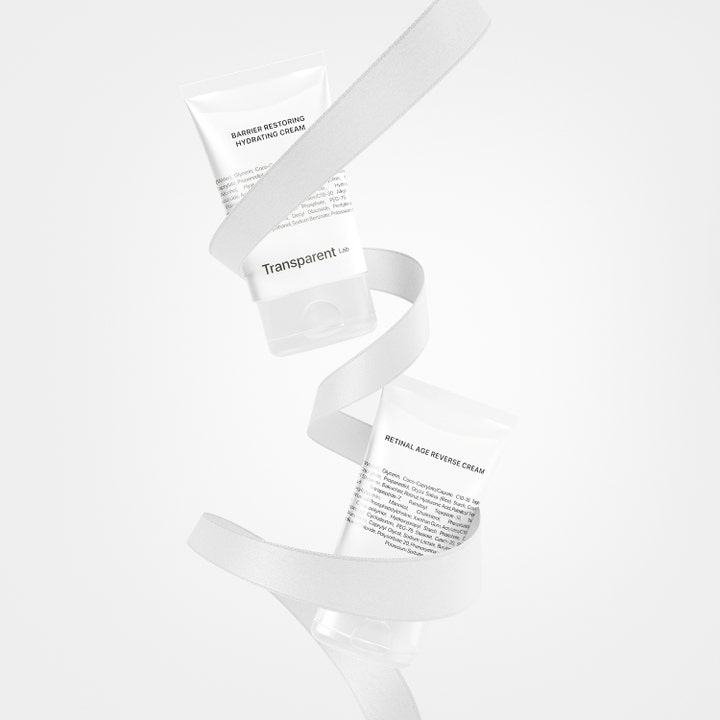 Niche Beauty Lab Transparent Lab Barrier Restoring Hydrating Cream 50 ml fuktgivende ansiktskrem i svevende hvite tuber.