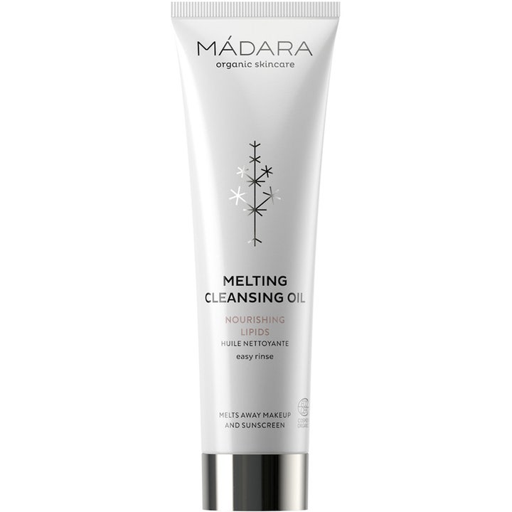 Mádara Melting Cleansing Oil nærende ansiktsrens i hvit tube med sølvfarget kork som effektivt fjerner sminke.