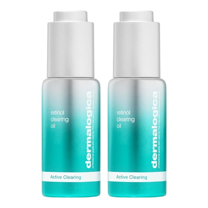 Dermalogica Retinol Clearing Oil ansiktsolje som gir renere hud i to turkise flasker med sølvfargede detaljer.