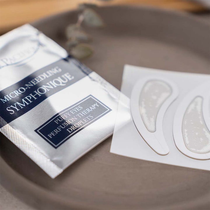Beauté Pacifique Symphonique Puffy Eyes kit mot hovne øyne viser hvite øyelapper og emballasje