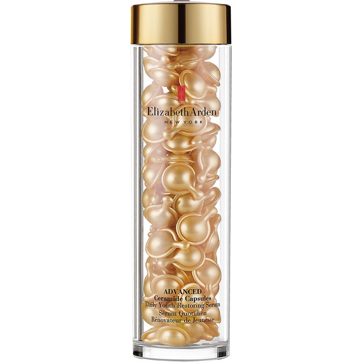 Elizabeth Arden Advanced Ceramide Capsules ansiktsserum styrker huden med gylne kapsler i en gjennomsiktig beholder