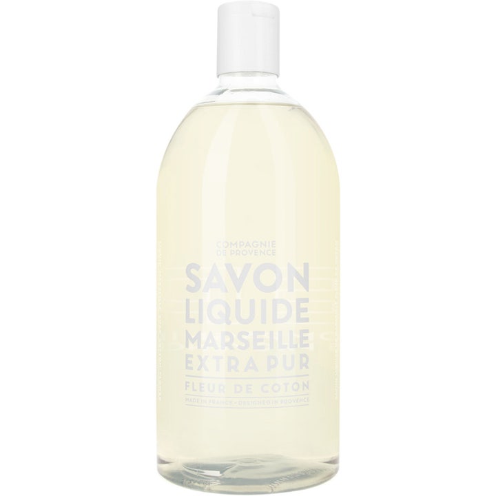Compagnie de Provence Savon Liquide Cotton Flower 1000ml flytende såpe som gir ren hud i en klar flaske med hvit kork