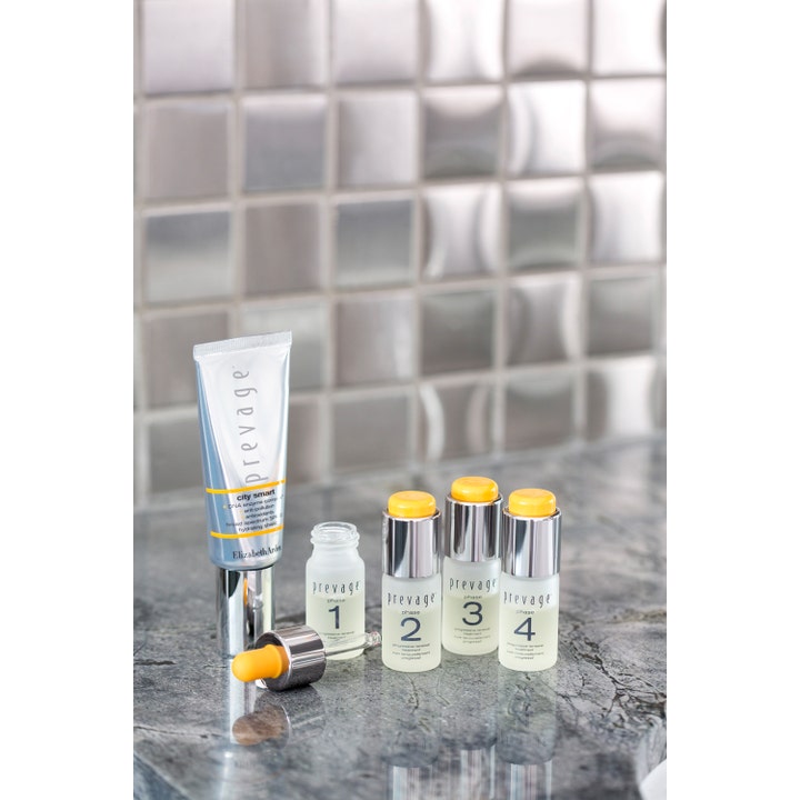 Elizabeth Arden Prevage Progressive Renewal Treatment 4x10ml fornyende serum i fire glassflasker og en sølvfarget tube