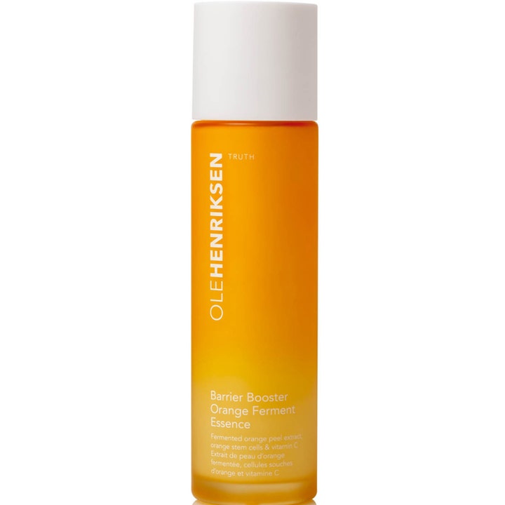 Olehenriksen Truth Barrier Booster Orange Ferment Essence 120 ml ansiktsessens i oransje flaske med hvitt lokk.