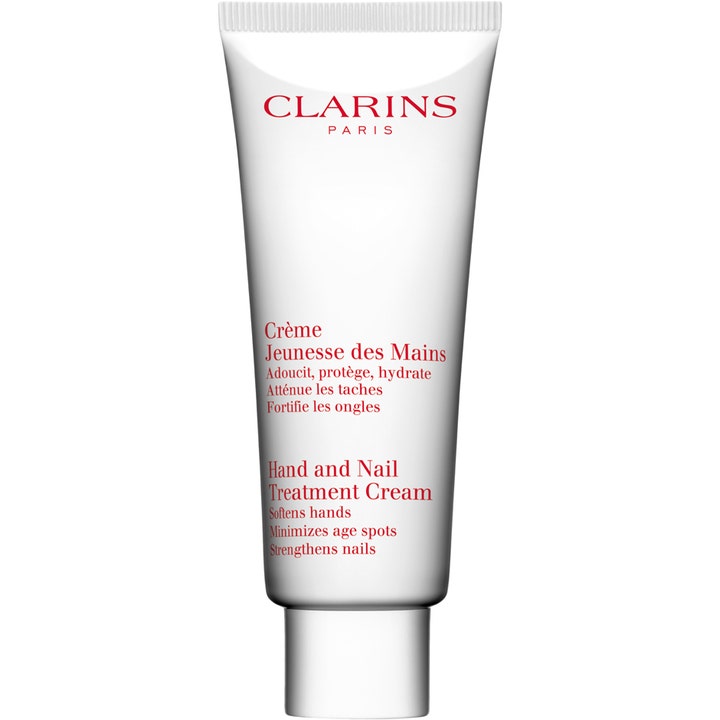 Clarins Hand and Nail Treatment Cream mykgjørende håndkrem i hvit tube med rød tekst som styrker neglene.