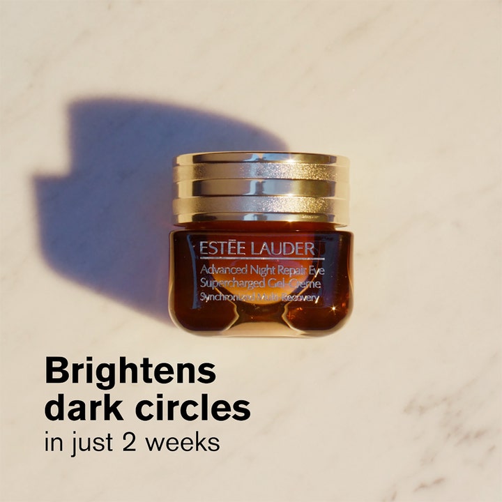 Estée Lauder Advanced Night Repair Eye 15 ml øyekrem lysner mørke ringer på 2 uker, brun krukke med gullokk på marmor.