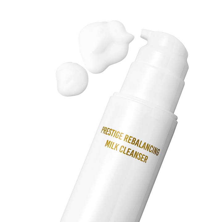 Lenoites Prestige Rebalancing Milk Cleanser 200 ml balanserende rengjøringsmelk med hvit kremet tekstur og pumpe.