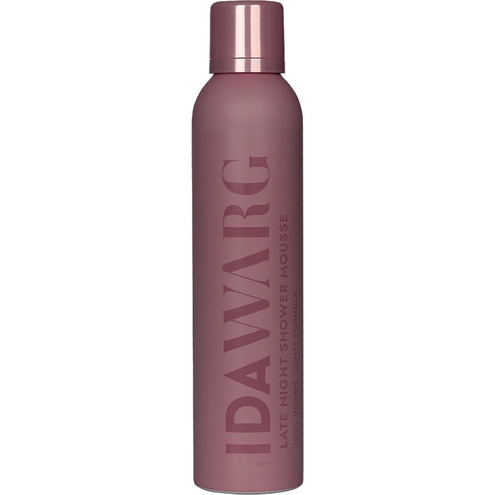 Ida Warg Late Night Shower Mousse 200 ml i en matt lilla sprayflaske som gir en behagelig dusjopplevelse.