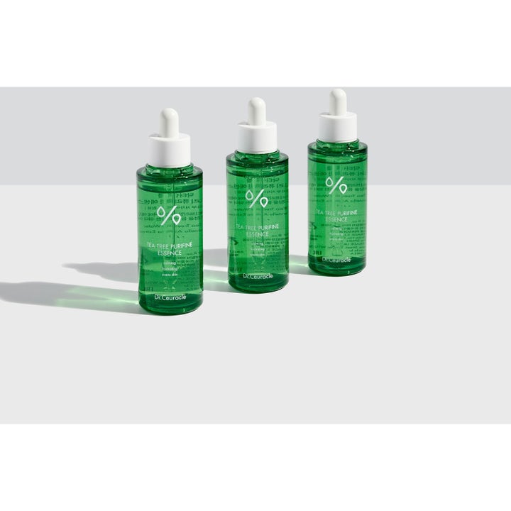 Dr. Ceuracle Tea Tree Purifine Essence 50 ml beroligende ansiktssessens i tre grønne glassflasker med hvit pipette