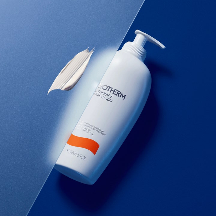 Biotherm Baume Corps Oil Therapy 400 ml fuktighetsgivende body lotion i hvit pumpeflaske med fyldig kremtekstur