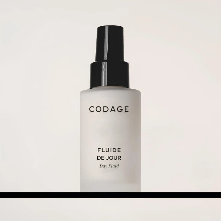 Codage Paris The Mattifying Day Fluid 50 ml mattende dagkrem i frostet glassflaske med svart pumpe og kork