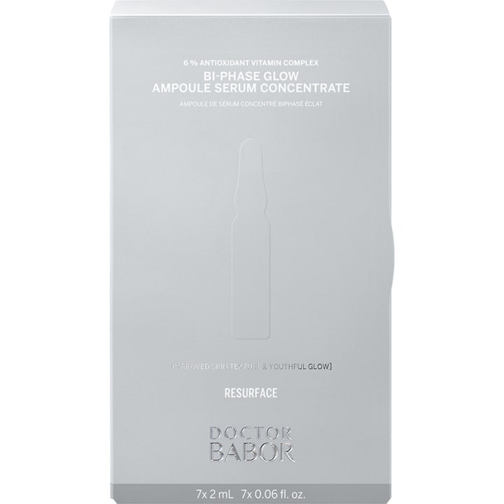 Doctor Babor Bi-Phase Glow Ampoule Serum 14 ml i sølv eske med 6 % vitamin complex som gir huden fornyet glød.