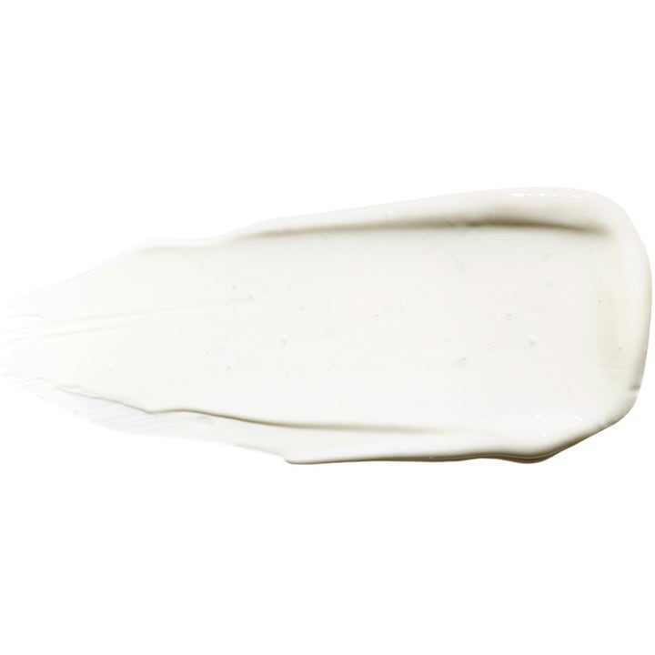 Exuviance Daily Corrector SPF35 40 g solkrem for ansiktet med en glatt og hvit kremaktig tekstur