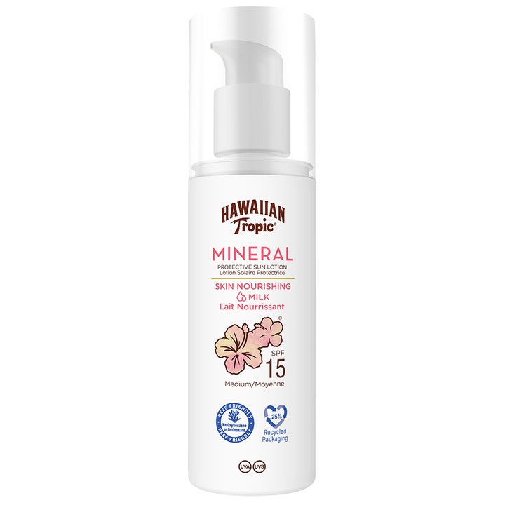 Hawaiian Tropic Mineral Skin Nourishing Milk SPF 15 pleiende solkrem i hvit pumpeflaske med dekorativ hibiscusblomst