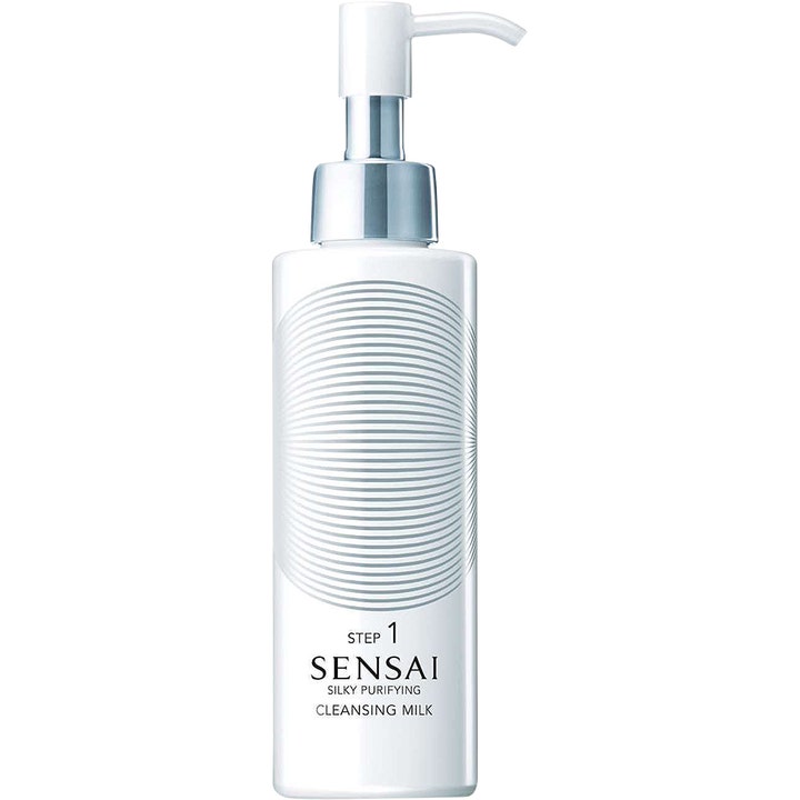 Sensai Silky Purifying Cleansing Milk Step 1 rensemelk som renser huden i hvit flaske med sølvpumpe og sirkulært mønster.