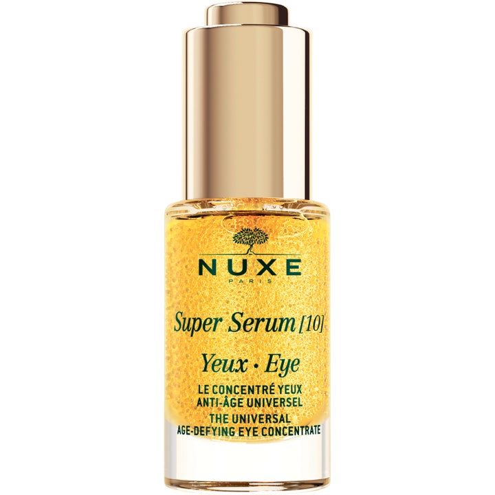 Nuxe Super Serum [10] Eye 15 ml antialdrende øyeserum i glassflaske med gullkork og synlige gylne oljeperler