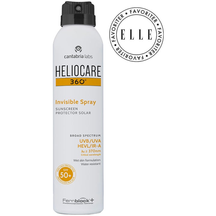 Heliocare Invisible Spray SPF 50+ 200 ml solkrem til kropp i hvit sprayflaske med svart munnstykke og Elle Favoriter emblem