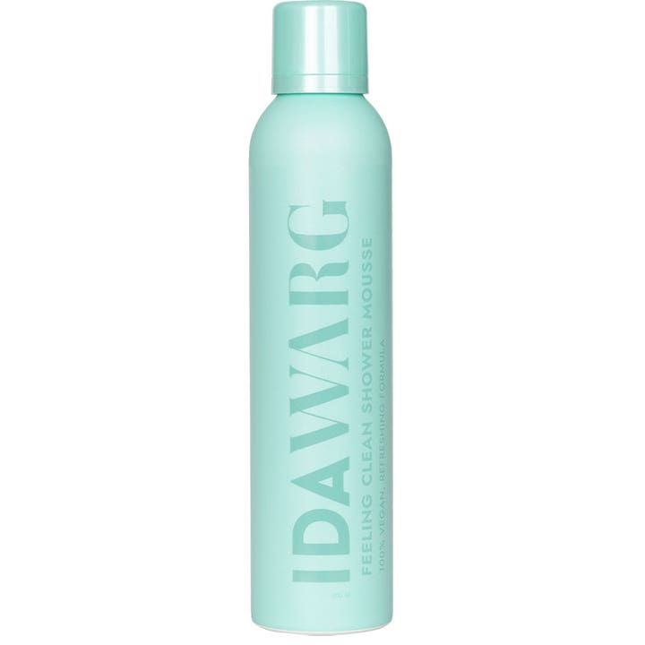 Ida Warg Feeling Clean Shower Mousse 200 ml oppfriskende dusjskum i en lysegrønn sylindrisk sprayflaske med hvit tekst