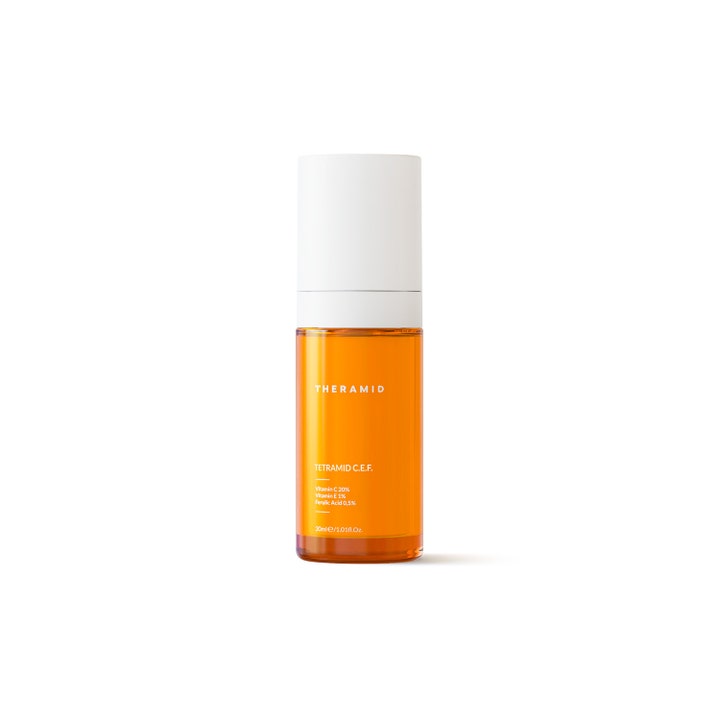 Theramid Tetramid C.E.F. 30 ml glødgivende ansiktsserum med vitamin C i oransje glassflaske med hvit kork