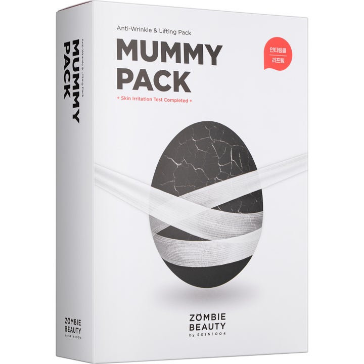 Skin1004 Zombie Beauty Mummy Pack ansiktsmaske mot rynker i hvit eske med et svart egg i hvit bandasje