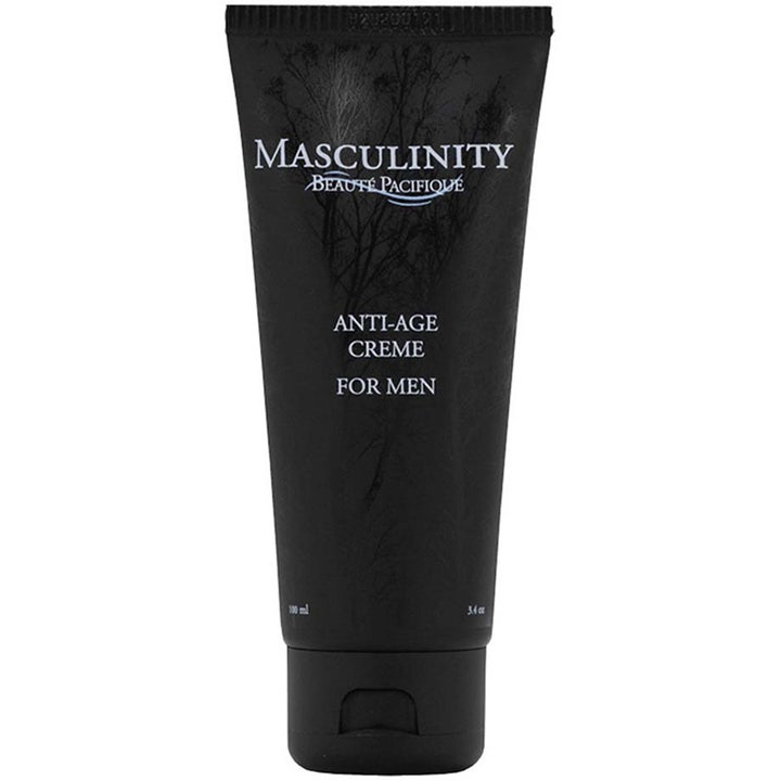 Beauté Pacifique Masculinity Anti-Age Creme 100 ml reduserer aldringstegn i en svart tube med hvit skrift og grafikk.
